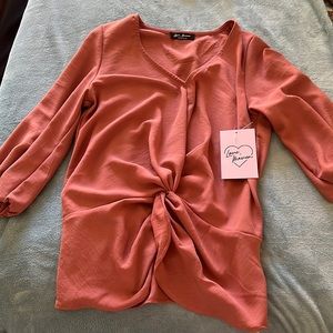 Mauve colored 3/4 sleeve blouse